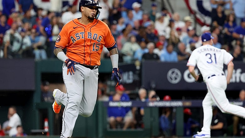 Oct 18, 2023; Arlington, Texas, USA; Houston Astros catcher Martin Maldonado (15) hits a RBI single during the second inning of game three of the ALCS against the Texas Rangers in the 2023 MLB playoffs at Globe Life Field. Mandatory Credit: Kevin Jairaj-USA TODAY Sports