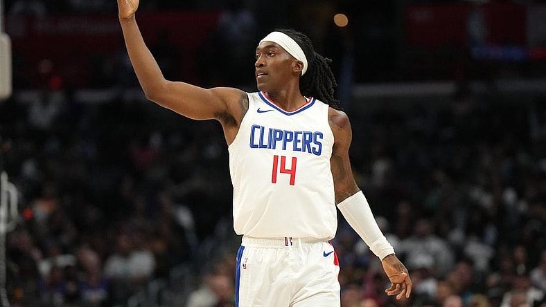 Oct 19, 2023; Los Angeles, California, USA; LA Clippers guard Terance Mann (14) celebrates against the Denver Nuggets in the first half at Crypto.com Arena. Mandatory Credit: Kirby Lee-USA TODAY Sports