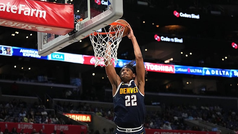 Oct 19, 2023; Los Angeles, California, USA; Denver Nuggets forward Zeke Nnaji (22) dunks the ball against the LA Clippers in the second half at Crypto.com Arena. Mandatory Credit: Kirby Lee-USA TODAY Sports