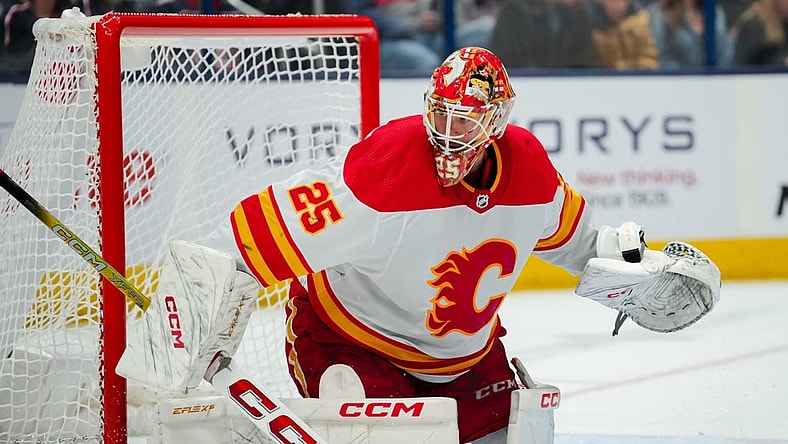 Oct 20, 2023; Columbus, Ohio, USA;  Calgary Flames goaltender Jacob Markstrom (25) defends the net against the Columbus Blue Jackets in the third period at Nationwide Arena. Mandatory Credit: Aaron Doster-USA TODAY Sports