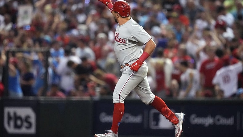 Philadelphia Phillies designated hitter Kyle Schwarber (12) celebrates after hitting a home run during the fourth inning against the Arizona Diamondbacks in game four of the NLCS of the 2023 MLB playoffs at Chase Field in Phoenix on Oct. 20, 2023.