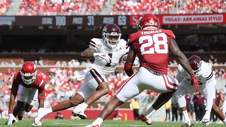 Oct 21, 2023; Fayetteville, Arkansas, USA; Mississippi State Bulldogs wide receiver Zavion Thomas (1) runs after a catch against the Arkansas Razorbacks in the second quarter at Donald W. Reynolds Razorback Stadium. Mandatory Credit: Nelson Chenault-USA TODAY Sports