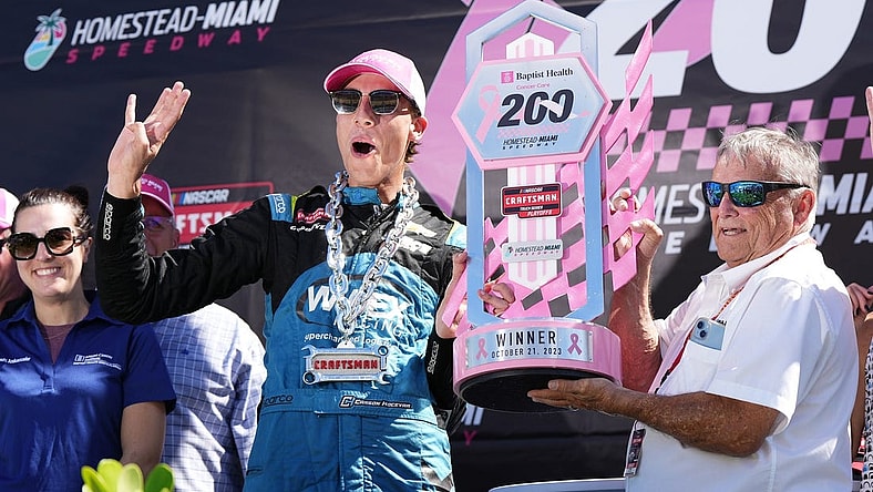 Oct 21, 2023; Homestead, Florida, USA; NASCAR Craftsman Truck Series driver Carson Hocevar (42) celebrates after winning the Baptist Health Cancer Care 200 at Homestead-Miami Speedway. Mandatory Credit: Jasen Vinlove-USA TODAY Sports