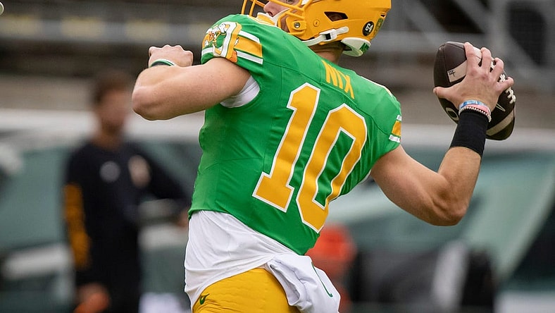 Oregon quarterback Bo Nix throws out a pass during warm ups as the No. 9 Oregon Ducks host Washington State Saturday, Oct. 21, 2023, at Autzen Stadium in Eugene, Ore.