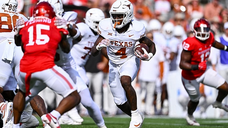Oct 21, 2023; Houston, Texas, USA; Texas Longhorns running back CJ Baxter (4) runs the ball during the second quarter against the Houston Cougars at TDECU Stadium. Mandatory Credit: Maria Lysaker-USA TODAY Sports