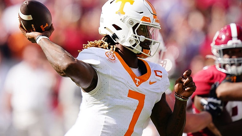 Oct 21, 2023; Tuscaloosa, Alabama, USA; Tennessee Volunteers quarterback Joe Milton III (7) passing against the Alabama Crimson Tide during the first half at Bryant-Denny Stadium. Mandatory Credit: John David Mercer-USA TODAY Sports