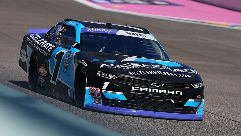 Oct 21, 2023; Homestead, Florida, USA; NASCAR Xfinity Series driver Sam Mayer (1) races during the Contender Boats 300 at Homestead-Miami Speedway. Mandatory Credit: Jasen Vinlove-USA TODAY Sports