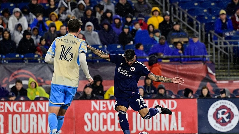 Oct 21, 2023; Foxborough, Massachusetts, USA; New England Revolution forward Gustavo Bou (7) shoots against the Philadelphia Union during the first half at Gillette Stadium. Mandatory Credit: Eric Canha-USA TODAY Sports