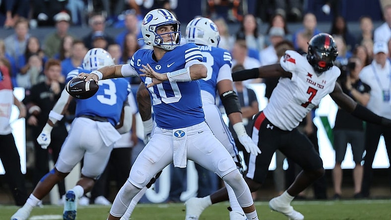 Oct 21, 2023; Provo, Utah, USA; Brigham Young Cougars quarterback Kedon Slovis (10) passes the ball against the Texas Tech Red Raiders in the first quarter at LaVell Edwards Stadium. Mandatory Credit: Rob Gray-USA TODAY Sports