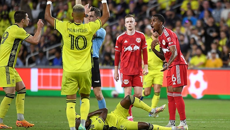 Oct 21, 2023; Nashville, Tennessee, USA; New York Red Bulls defender Kyle Duncan (6) reacts after being given a yellow card against the Nashville SC during the second half at Geodis Park. Mandatory Credit: Christopher Hanewinckel-USA TODAY Sports