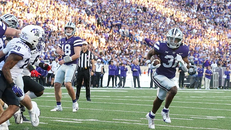 Oct 21, 2023; Manhattan, Kansas, USA; Kansas State Wildcats running back DJ Giddens (31) scores an easy touchdown during the first quarter against the TCU Horned Frogs at Bill Snyder Family Football Stadium. Mandatory Credit: Scott Sewell-USA TODAY Sports