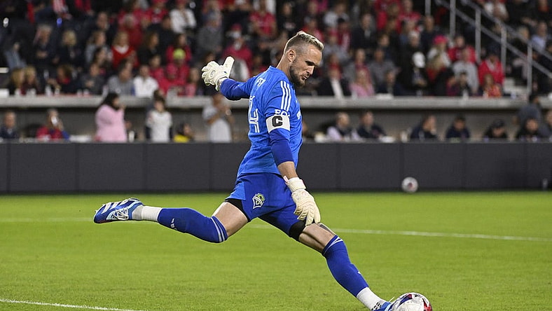 Oct 21, 2023; St. Louis, Missouri, USA; Seattle Sounders goalkeeper Stefan Frei (24) drives the ball against St. Louis City in the second half at CITYPARK. Mandatory Credit: Joe Puetz-USA TODAY Sports