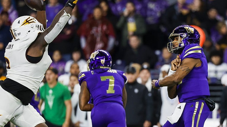 Oct 21, 2023; Seattle, Washington, USA; Arizona State Sun Devils defensive tackle Dashaun Mallory (0) blocks a pass attempt by Washington Huskies quarterback Michael Penix Jr. (9) during the second quarter at Alaska Airlines Field at Husky Stadium. Mandatory Credit: Joe Nicholson-USA TODAY Sports