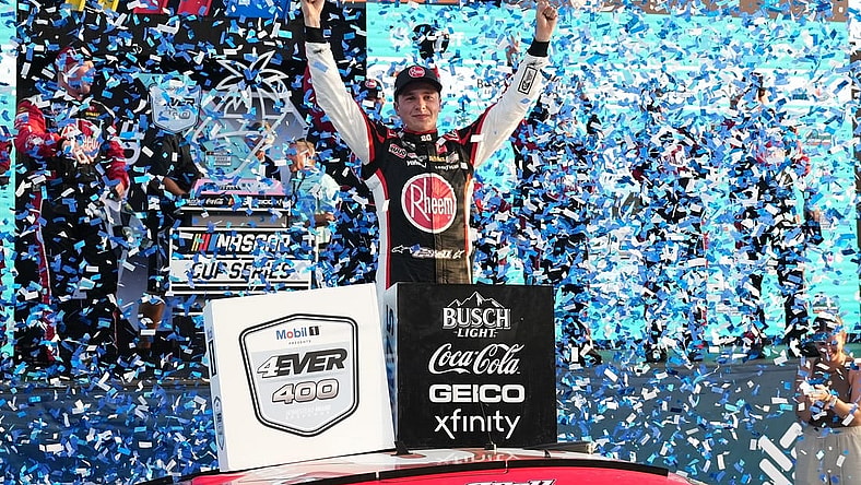 Oct 22, 2023; Homestead, Florida, USA; NASCAR Cup Series driver Christopher Bell (20) celebrates in victory lane after winning the 4EVER 400 presented by Mobil 1 at Homestead-Miami Speedway. Mandatory Credit: Jasen Vinlove-USA TODAY Sports
