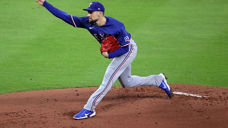 Oct 22, 2023; Houston, Texas, USA; Texas Rangers starting pitcher Nathan Eovaldi (17) throws a pitch against the Houston Astros in the first inning during game six of the ALCS for the 2023 MLB playoffs at Minute Maid Park. Mandatory Credit: Erik Williams-USA TODAY Sports