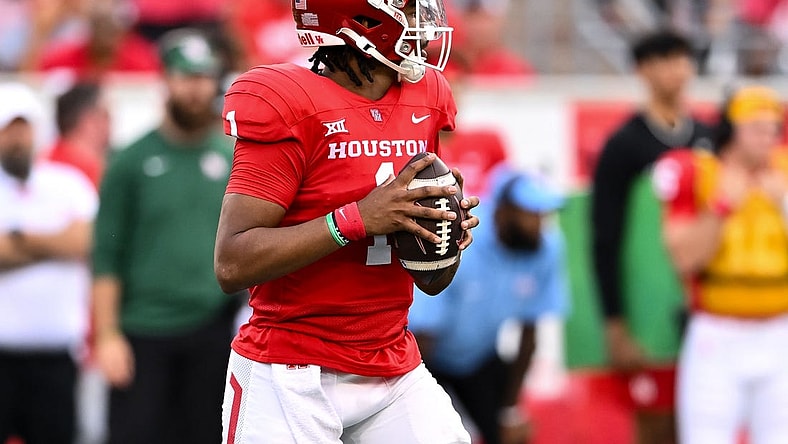 Oct 21, 2023; Houston, Texas, USA; Houston Cougars quarterback Donovan Smith (1) looks to pass the ball during the third quarter against the Texas Longhorns at TDECU Stadium. Mandatory Credit: Maria Lysaker-USA TODAY Sports