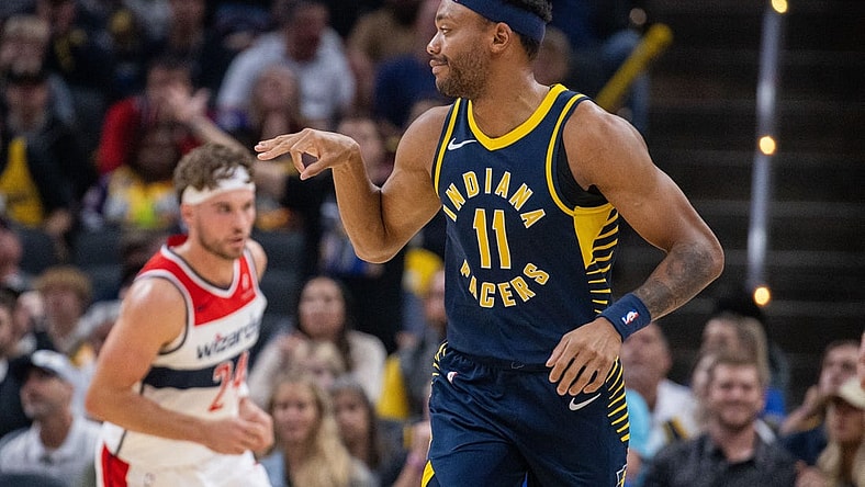 Oct 25, 2023; Indianapolis, Indiana, USA; Indiana Pacers forward Bruce Brown (11) celebrates a made three point basket in the second quarter against the Washington Wizards at Gainbridge Fieldhouse. Mandatory Credit: Trevor Ruszkowski-USA TODAY Sports