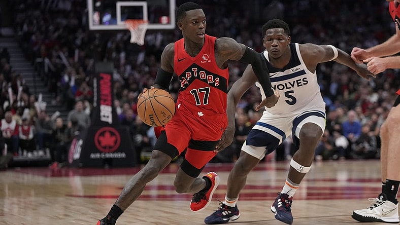 Oct 25, 2023; Toronto, Ontario, CAN; Toronto Raptors guard Dennis Schroder (17) drives to the net past Minnesota Timberwolves guard Anthony Edwards (5) during the second half at Scotiabank Arena. Mandatory Credit: John E. Sokolowski-USA TODAY Sports