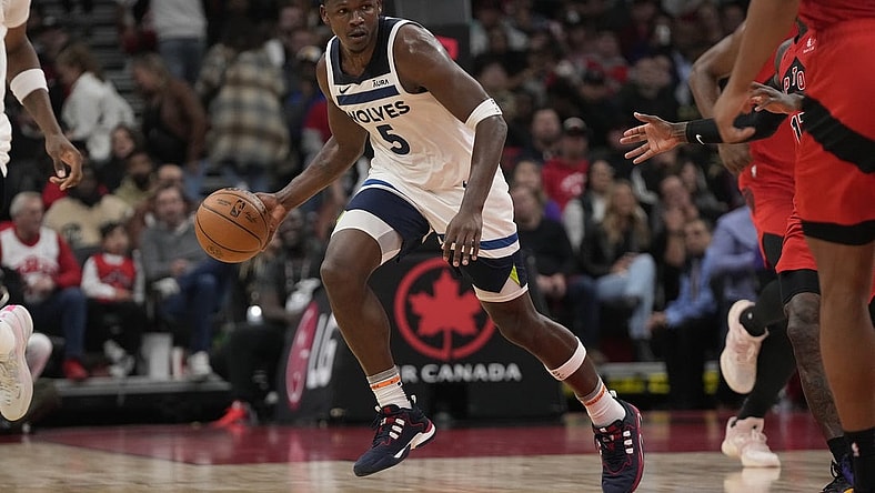Oct 25, 2023; Toronto, Ontario, CAN; Minnesota Timberwolves guard Anthony Edwards (5) dribbles the ball against the Toronto Raptors during the first half at Scotiabank Arena. Mandatory Credit: John E. Sokolowski-USA TODAY Sports