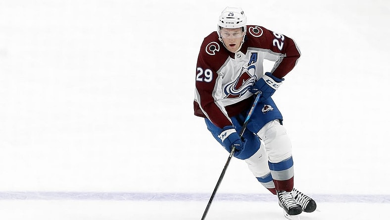 Oct 26, 2023; Pittsburgh, Pennsylvania, USA; Colorado Avalanche center Nathan MacKinnon (29) skates up ice with the puck against the Pittsburgh Penguins during the second period at PPG Paints Arena. The Penguins shutout the Avalanche 4-0. Mandatory Credit: Charles LeClaire-USA TODAY Sports