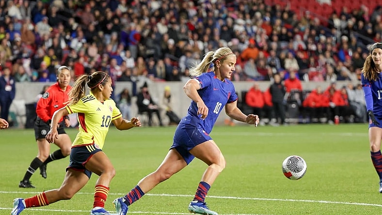 Oct 26, 2023; Sandy, Utah, USA; United States midfielder Lindsey Horan (10) keeps the ball away from Colombia midfielder Leicy Santos (10) during the first half at America First Field. Mandatory Credit: Chris Nicoll-USA TODAY Sports