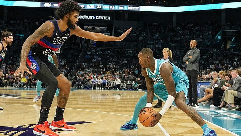 Oct 27, 2023; Charlotte, North Carolina, USA; Charlotte Hornets guard Terry Rozier (3) handles the ball against Detroit Pistons forward Marvin Bagley III (35) during the second quarter at Spectrum Center. Mandatory Credit: Jim Dedmon-USA TODAY Sports