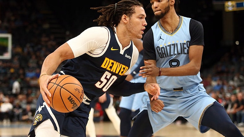 Oct 27, 2023; Memphis, Tennessee, USA; Denver Nuggets forward Aaron Gordon (50) moves to the basket as Memphis Grizzlies forward Ziaire Williams (8) defends during the first half at FedExForum. Mandatory Credit: Petre Thomas-USA TODAY Sports