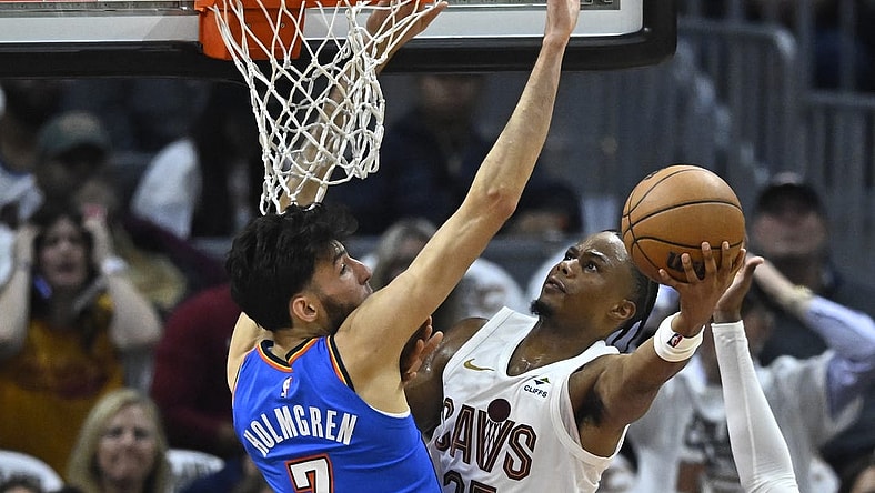 Oct 27, 2023; Cleveland, Ohio, USA; Cleveland Cavaliers forward Isaac Okoro (35) moves against Oklahoma City Thunder forward Chet Holmgren (7) in the second quarter at Rocket Mortgage FieldHouse. Mandatory Credit: David Richard-USA TODAY Sports