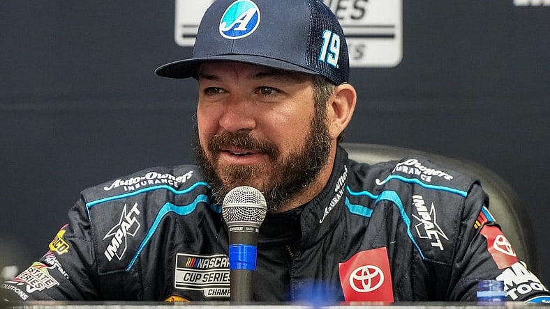 Oct 28, 2023; Martinsville, Virginia, USA; NASCAR Cup Series driver Martin Truex Jr. (19) addresses the media at Martinsville Speedway. Mandatory Credit: David Yeazell-USA TODAY Sports