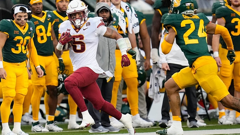 Oct 28, 2023; Waco, Texas, USA;  Iowa State Cyclones running back Eli Sanders (6) runs the ball as Baylor Bears safety Corey Gordon Jr. (24) gives chase during the first half at McLane Stadium. Mandatory Credit: Chris Jones-USA TODAY Sports