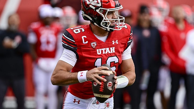 Oct 28, 2023; Salt Lake City, Utah, USA; Utah Utes quarterback Bryson Barnes (16) steps out of the pocket against the Oregon Ducks during the first half at Rice-Eccles Stadium. Mandatory Credit: Christopher Creveling-USA TODAY Sports