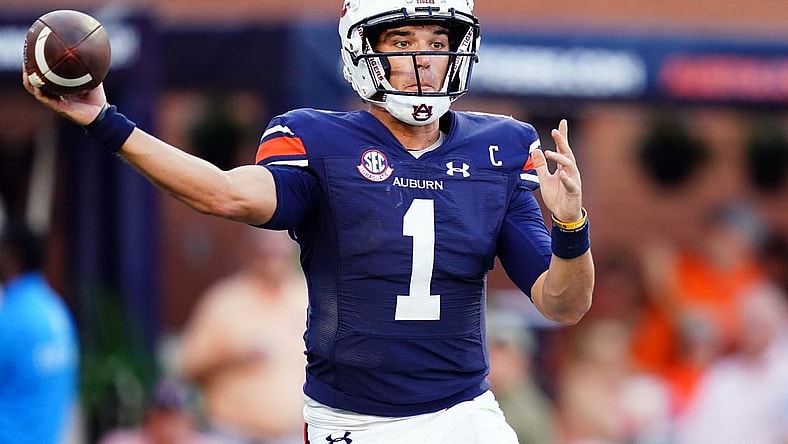 Oct 28, 2023; Auburn, Alabama, USA; Auburn Tigers quarterback Payton Thorne (1) rolls out to pass against the Mississippi State Bulldogs during the fourth quarter at Jordan-Hare Stadium. Mandatory Credit: John David Mercer-USA TODAY Sports