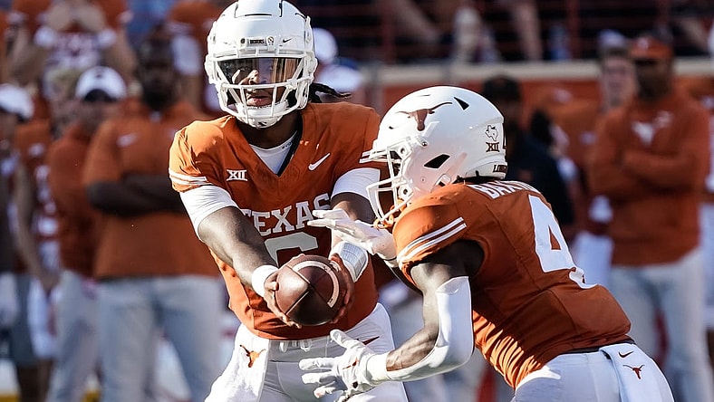 Oct 28, 2023; Austin, Texas, USA; Texas Longhorns quarterback Maalik Murphy (6) hands off to running back CJ Baxter (4) during the second half against the Brigham Young Cougars at Darrell K Royal-Texas Memorial Stadium. Mandatory Credit: Scott Wachter-USA TODAY Sports