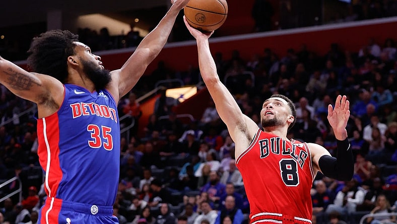 Oct 28, 2023; Detroit, Michigan, USA;  Chicago Bulls guard Zach LaVine (8) shoots on Detroit Pistons forward Marvin Bagley III (35) in the second half at Little Caesars Arena. Mandatory Credit: Rick Osentoski-USA TODAY Sports