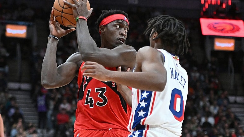 Oct 28, 2023; Toronto, Ontario, CAN;  Toronto Raptors forward Pascal Siakam (43) looks to make a pass as Philadelphia 76ers guard Tyrese Maxey (0) defends in the second half at Scotiabank Arena. Mandatory Credit: Dan Hamilton-USA TODAY Sports