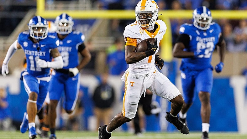 Oct 28, 2023; Lexington, Kentucky, USA; Tennessee Volunteers quarterback Joe Milton III (7) runs the ball during the third quarter against the Kentucky Wildcats at Kroger Field. Mandatory Credit: Jordan Prather-USA TODAY Sports