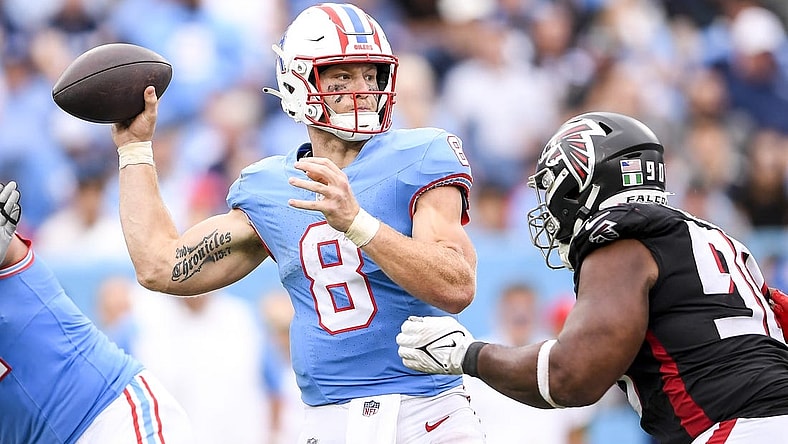 Oct 29, 2023; Nashville, Tennessee, USA; Tennessee Titans quarterback Will Levis (8) throws a pass just before getting hit by Atlanta Falcons defensive tackle David Onyemata (90) during the second half at Nissan Stadium. Mandatory Credit: Steve Roberts-USA TODAY Sports
