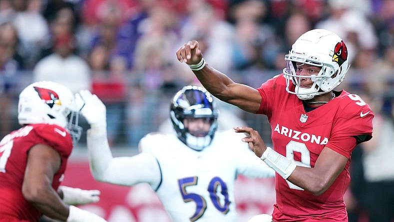 Oct 29, 2023; Glendale, Arizona, USA; Arizona Cardinals quarterback Joshua Dobbs (9) throws against the Baltimore Ravens during the second half at State Farm Stadium. Mandatory Credit: Joe Camporeale-USA TODAY Sports