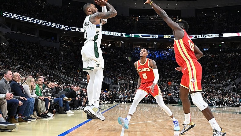 Oct 29, 2023; Milwaukee, Wisconsin, USA; Milwaukee Bucks guard Damian Lillard (0) puts up a shot agains the Atlanta Hawks in the second quarter at Fiserv Forum. Mandatory Credit: Michael McLoone-USA TODAY Sports