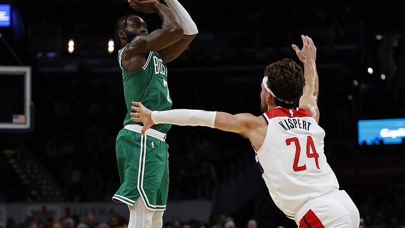 Oct 30, 2023; Washington, District of Columbia, USA; Boston Celtics guard Jaylen Brown (7) shoots the ball over Washington Wizards forward Corey Kispert (24) in the second quarter at Capital One Arena. Mandatory Credit: Geoff Burke-USA TODAY Sports
