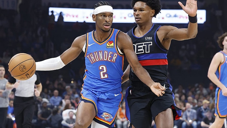 Oct 30, 2023; Oklahoma City, Oklahoma, USA; Oklahoma City Thunder guard Shai Gilgeous-Alexander (2) drives around Detroit Pistons guard Killian Hayes (7) during the first quarter at Paycom Center. Mandatory Credit: Alonzo Adams-USA TODAY Sports