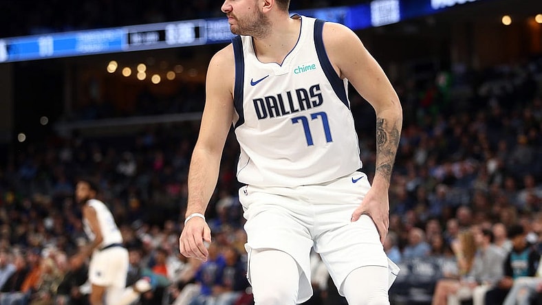 Oct 30, 2023; Memphis, Tennessee, USA; Dallas Mavericks guard Luka Doncic (77) reacts after being knocked down during the first half against the Memphis Grizzlies at FedExForum. Mandatory Credit: Petre Thomas-USA TODAY Sports