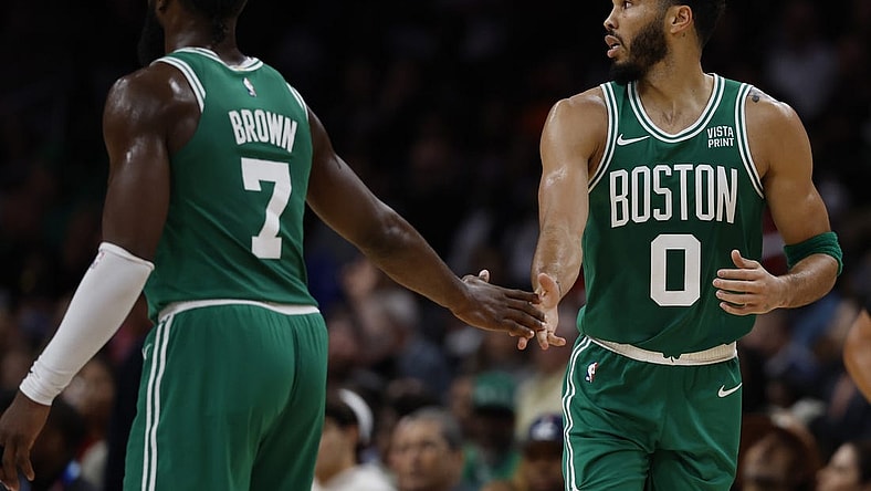 Oct 30, 2023; Washington, District of Columbia, USA; Boston Celtics forward Jayson Tatum (0) celebrates with Celtics guard Jaylen Brown (7) against the Washington Wizards in the third quarter at Capital One Arena. Mandatory Credit: Geoff Burke-USA TODAY Sports