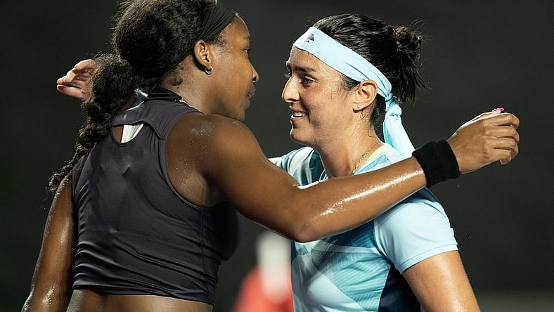 Oct 30, 2023; Cancun, Mexico;  Coco Gauff (USA) and Ons Jabeur (TUN) hug at the net after their match on day two of the GNP Saguaros WTA Finals Cancun. Mandatory Credit: Susan Mullane-USA TODAY Sports