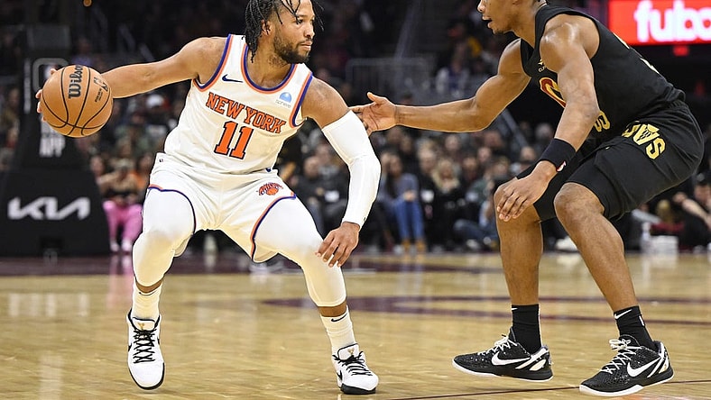 Oct 31, 2023; Cleveland, Ohio, USA; Cleveland Cavaliers forward Isaac Okoro (35) defends New York Knicks guard Jalen Brunson (11) in the second quarter at Rocket Mortgage FieldHouse. Mandatory Credit: David Richard-USA TODAY Sports