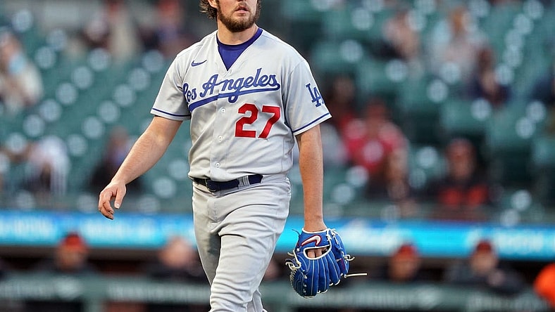 May 21, 2021; San Francisco, California, USA; Los Angeles Dodgers starting pitcher Trevor Bauer (27) walks to the dugout at the end of the first inning against the San Francisco Giants at Oracle Park. Mandatory Credit: Darren Yamashita-USA TODAY Sports