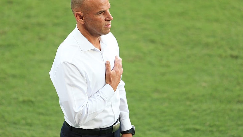 May 22, 2021; Orlando, Florida, USA; Toronto FC head coach Chris Armas stands for the National Anthem before the match against Orlando City at Orlando City Stadium. Mandatory Credit: Matt Stamey-USA TODAY Sports