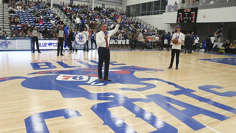 Gov. John Carney stands on the Delaware Blue Coats'  Caesar Rodney logo at the opening of Wilmington's Chase Fieldhouse in 2019. The logo has since been discontinued.

Blue Coats Open Field House