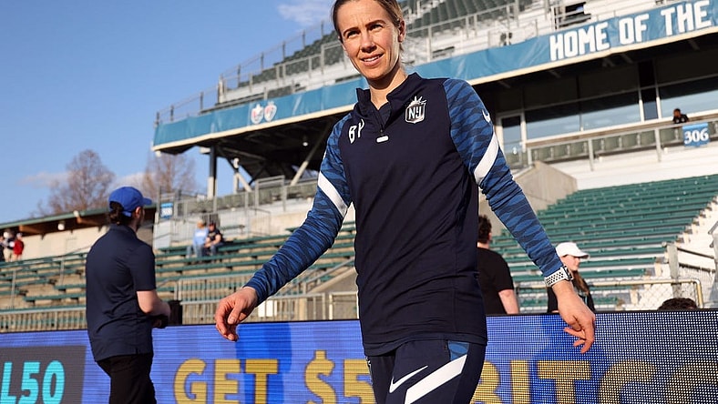 Mar 19, 2022; Cary, NC, USA; New Jersey/New York Gotham FC assistant coach Beverly Goebel Yanez takes the field for pregame warmups before playing North Carolina Courage in a NWSL Challenge Cup match at Sahlen's Stadium at WakeMed Soccer Park. Mandatory Credit: Andy Mead-USA TODAY Sports