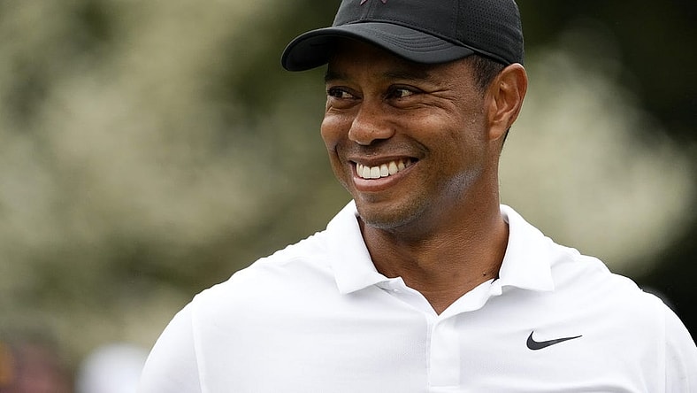 Apr 6, 2022; Augusta, Georgia, USA; Tiger Woods smiles at the practice facility during a practice round of The Masters golf tournament at Augusta National Golf Club. Mandatory Credit: Rob Schumacher-USA TODAY Sports